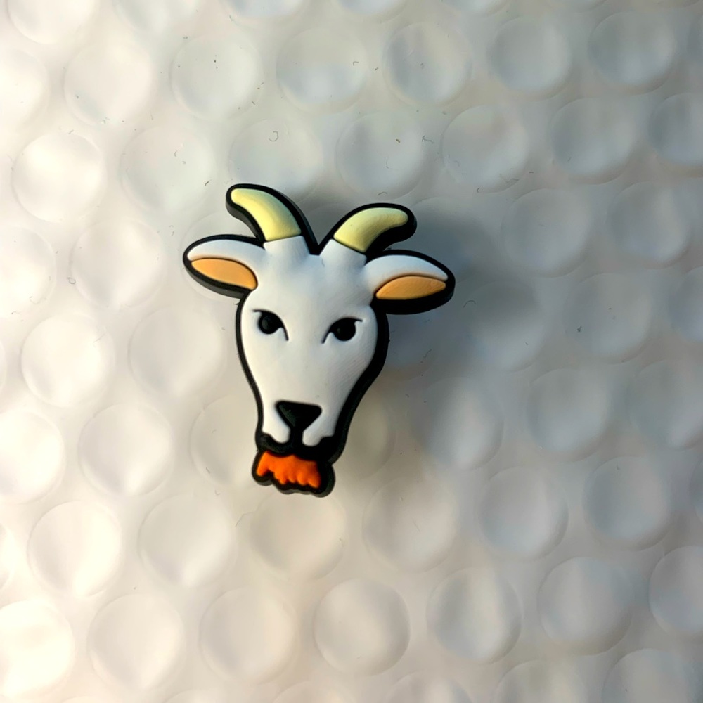 Goat croc charm
